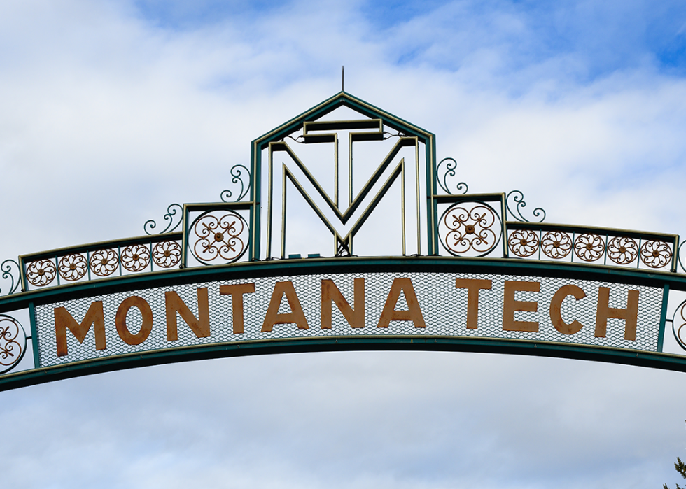 Montana Tech arched metal sign in closeup.