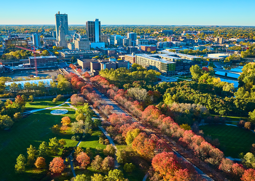 Aerial autumn urban park and cityscape.