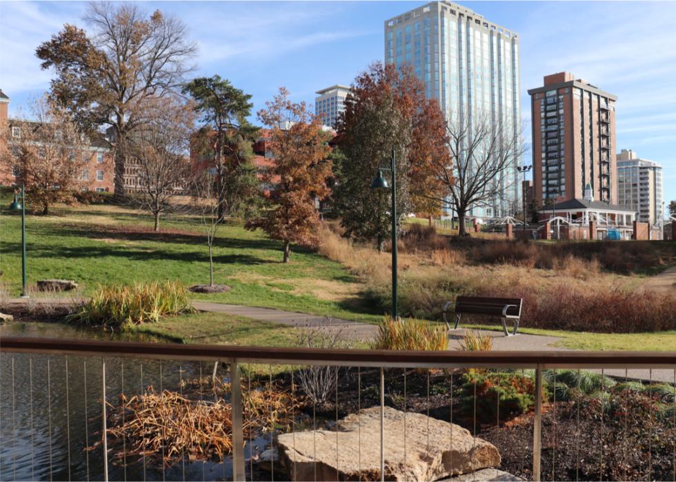 Fountain in park and buildings in Clayton.