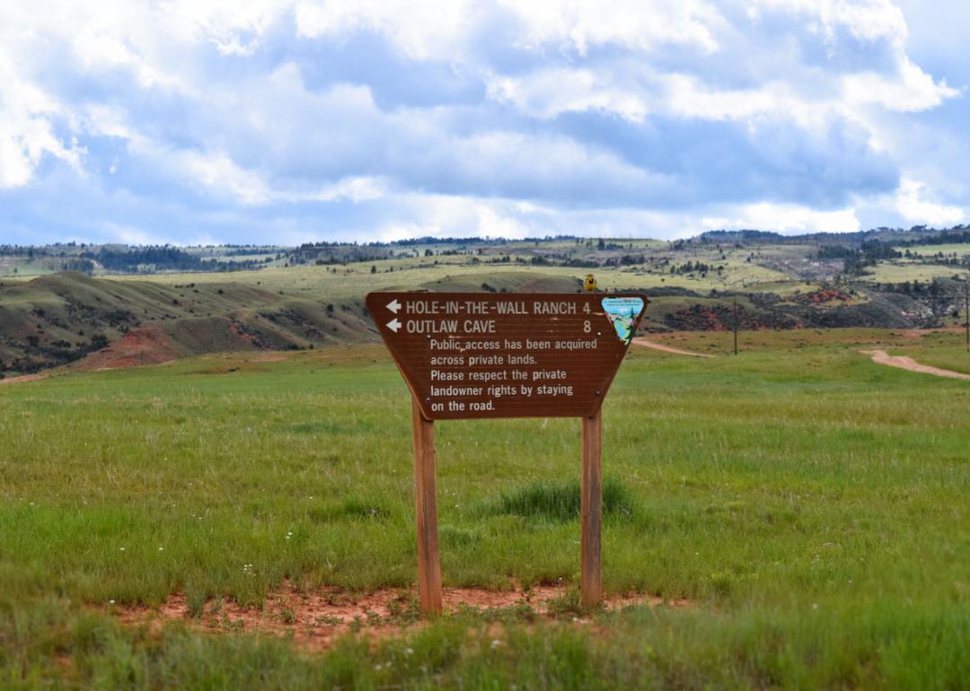 Entrance sign to "Hole in the Wall” hideout.