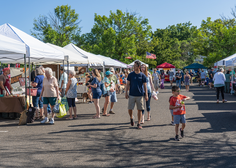 Families shopping at the Lansdale Farmers Market.