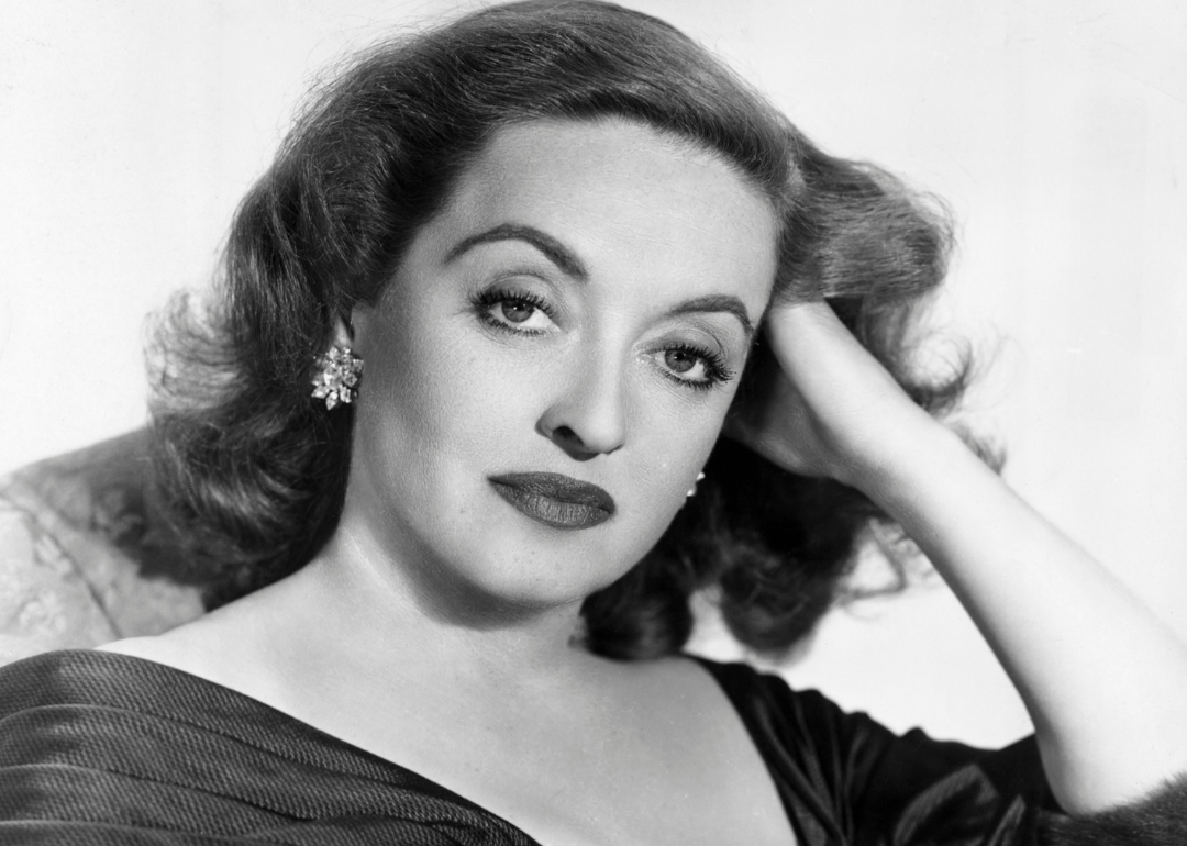 Bette Davis poses in studio portrait.