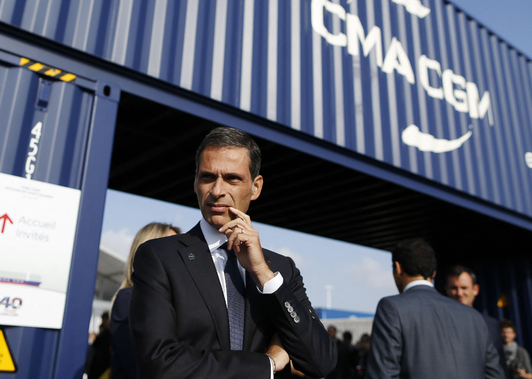Rodolphe Saade in front of CMA CGM container ship.