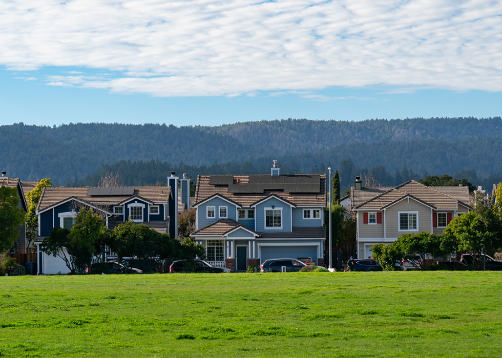 Single family homes in a small neighborhood tucked into a mountain valley.