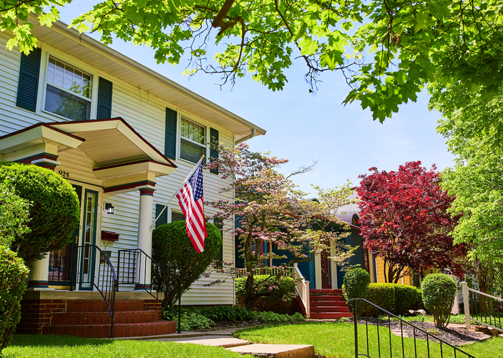 Suburban Home with American Flag.