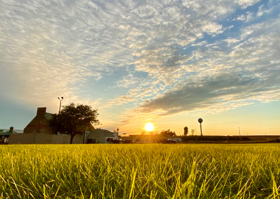 A farmhouse at sunset in Iowa.