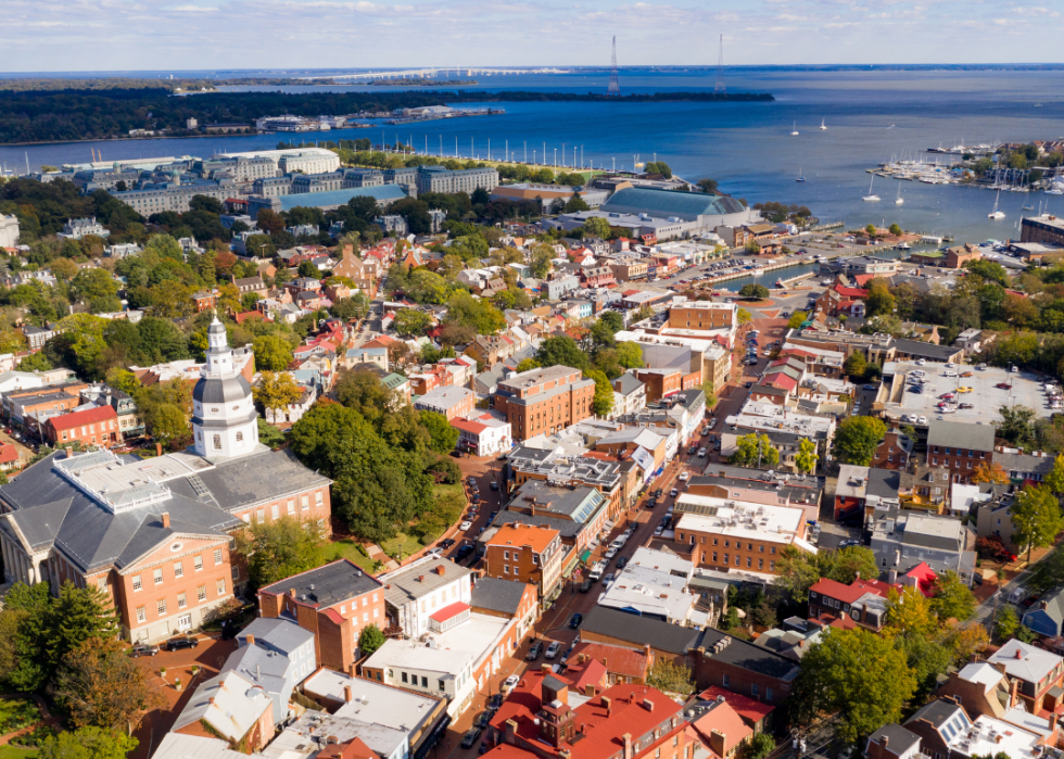 An aerial view of a city near the water.