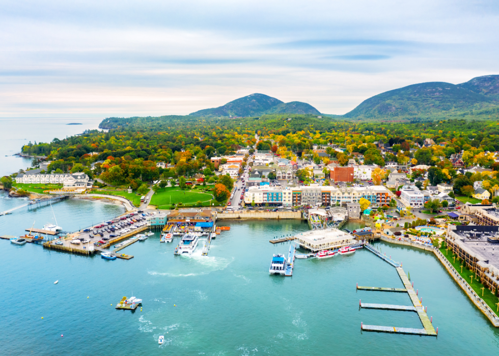 An aerial view of a harbor and town.