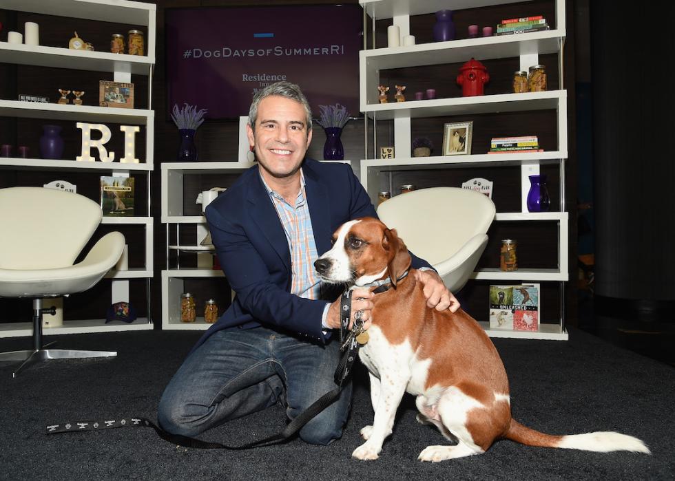Andy Cohen poses with his beagle Wacha at an adoption event in 2017 in New York City.