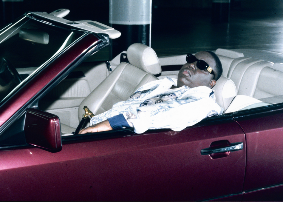 Notorious B.I.G. in a convertible.