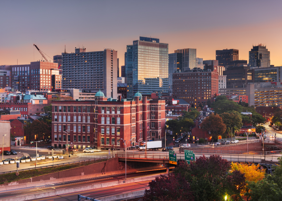 A city skyline over highways.