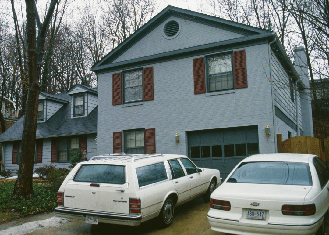Cars parked outside a suburban home in 1985.