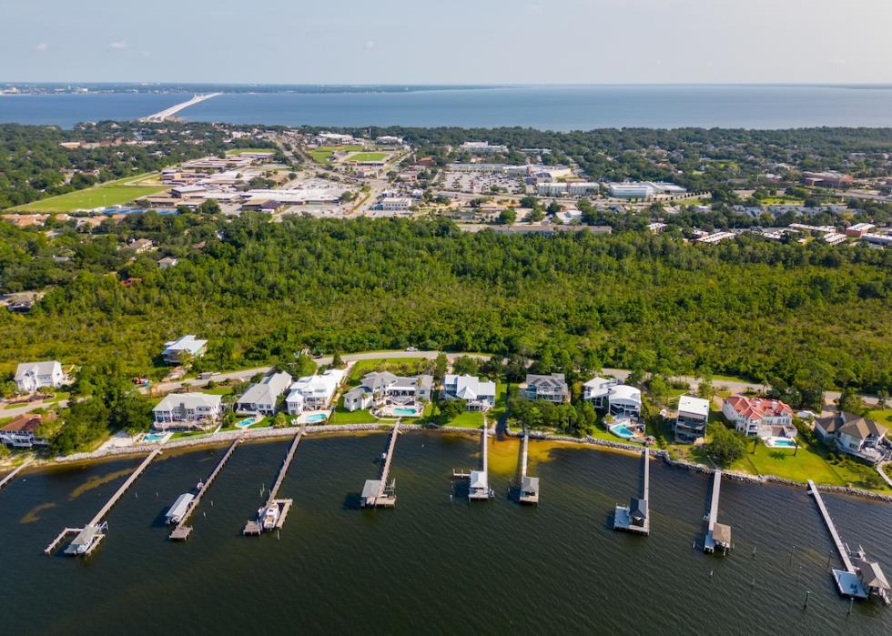 Aerial photo of luxury waterfront homes with docks in Gulf Breeze.