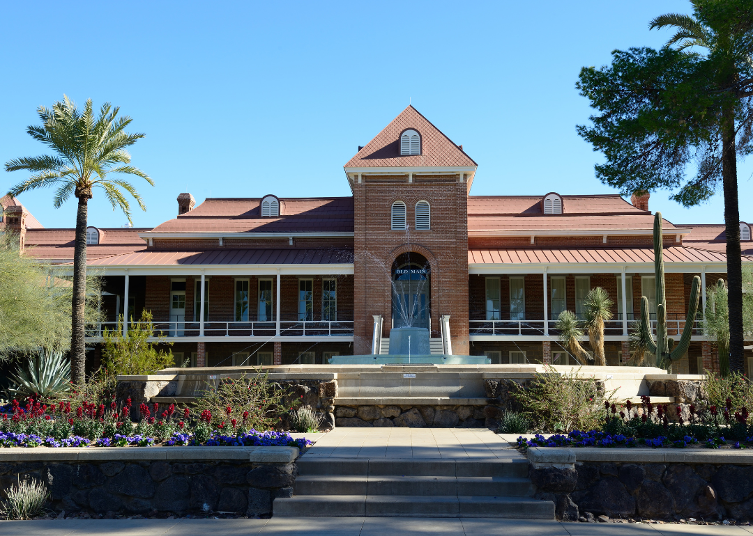 A brick building with a water feature at the University of Arizona.