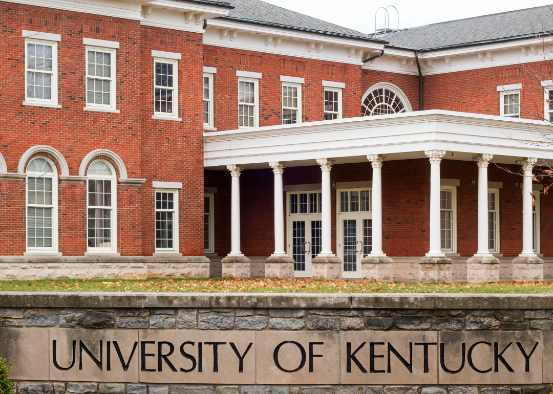 A red brick building with white trim at University of Kentucky.