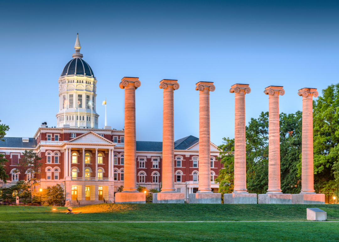 A row of stone columns in front of a historic building in Columbia.