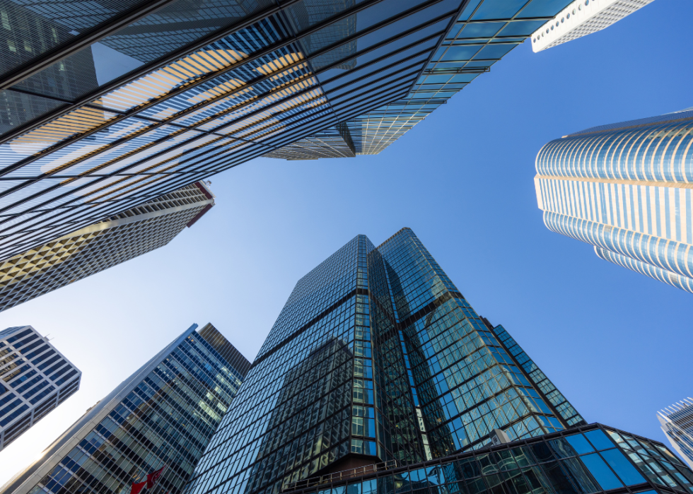 A view of tall glass buildings in a financial center.