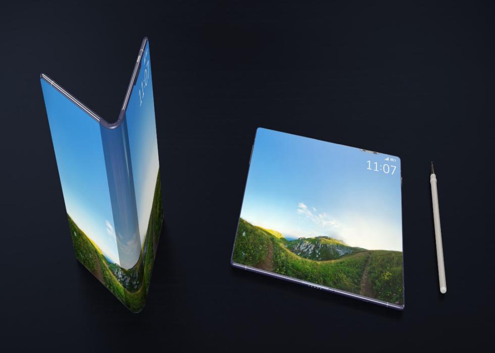Against a dark background, an image of two phones, one folding and one completely unfolded.