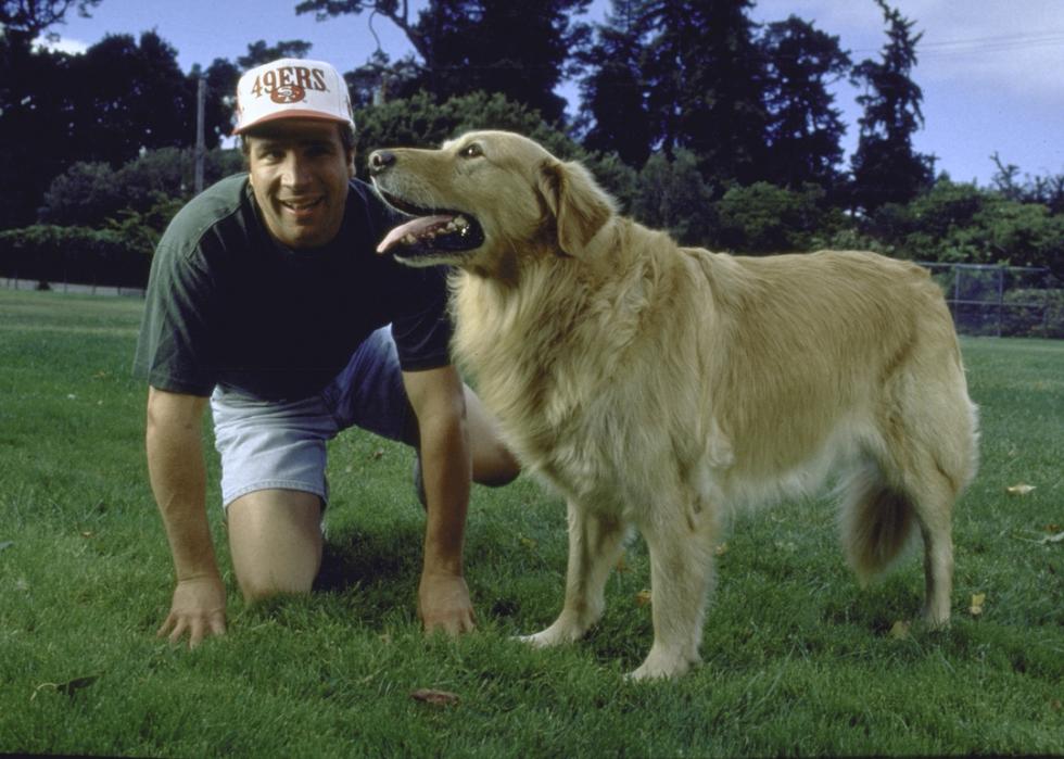 Golden retriever dog Buddy, basketball-playing star of the movie "Air Bud," with his owner Kevin DiCicco, near San Francisco.