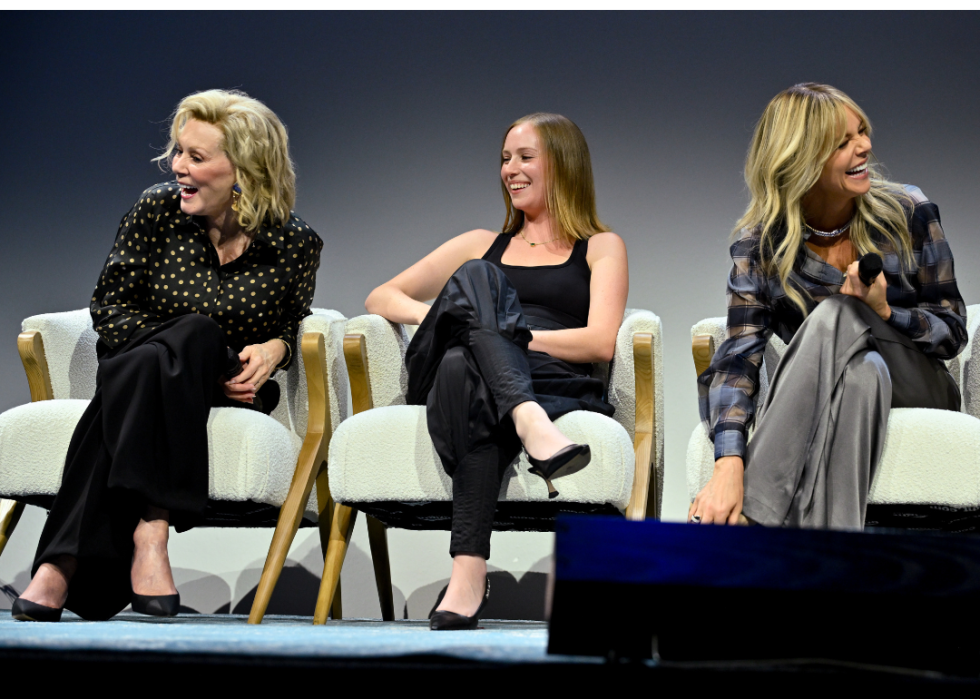 Jean Smart, Hannah Einbinder, and Kaitlin Olson seated on stage at the HBO Max Emmy Nominee Celebration Panel for Hacks in 2024.