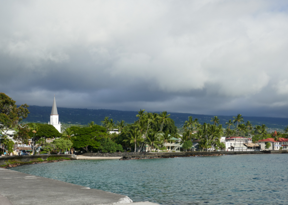 A view of Kailua Kona with storm clouds overhead.