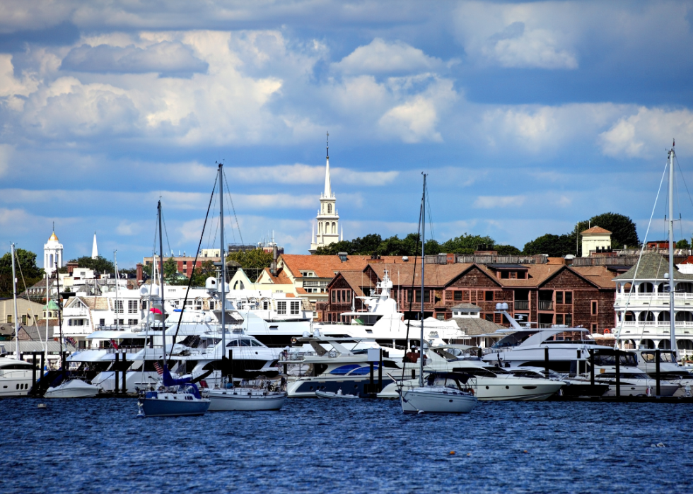 A group of boats docked in a harbor.