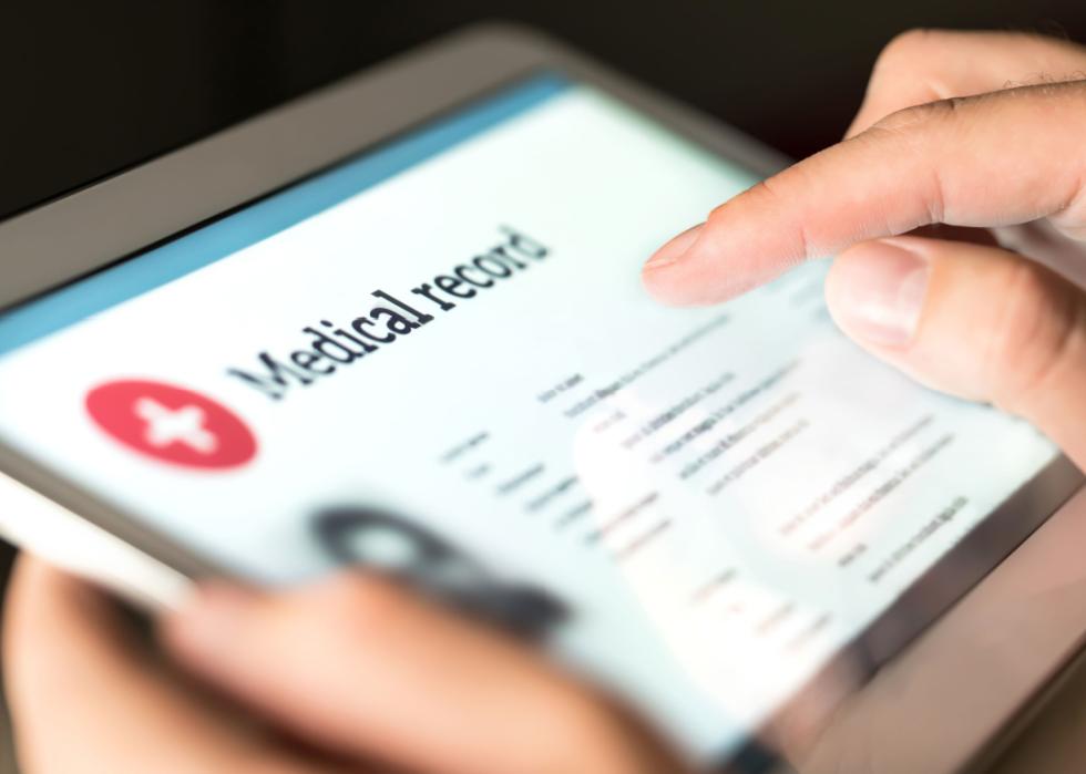 Electronic medical record with patient data on a tablet.