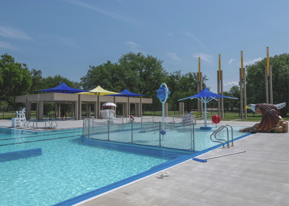 A concrete structure behind the Charles McAfee Swimming Pool and Pool House.
