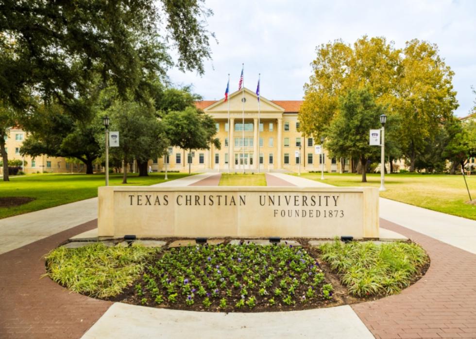 A stone sign in front of TCU.