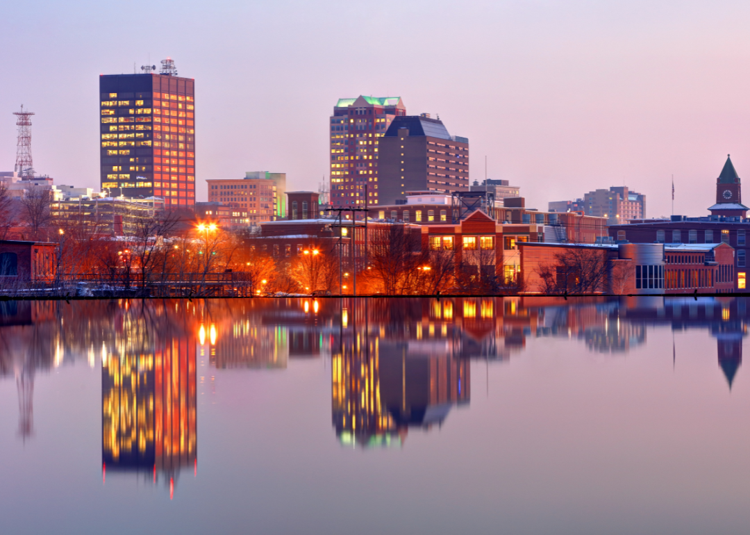 The skyline in downtown Manchester, New Hampshire, at dusk.