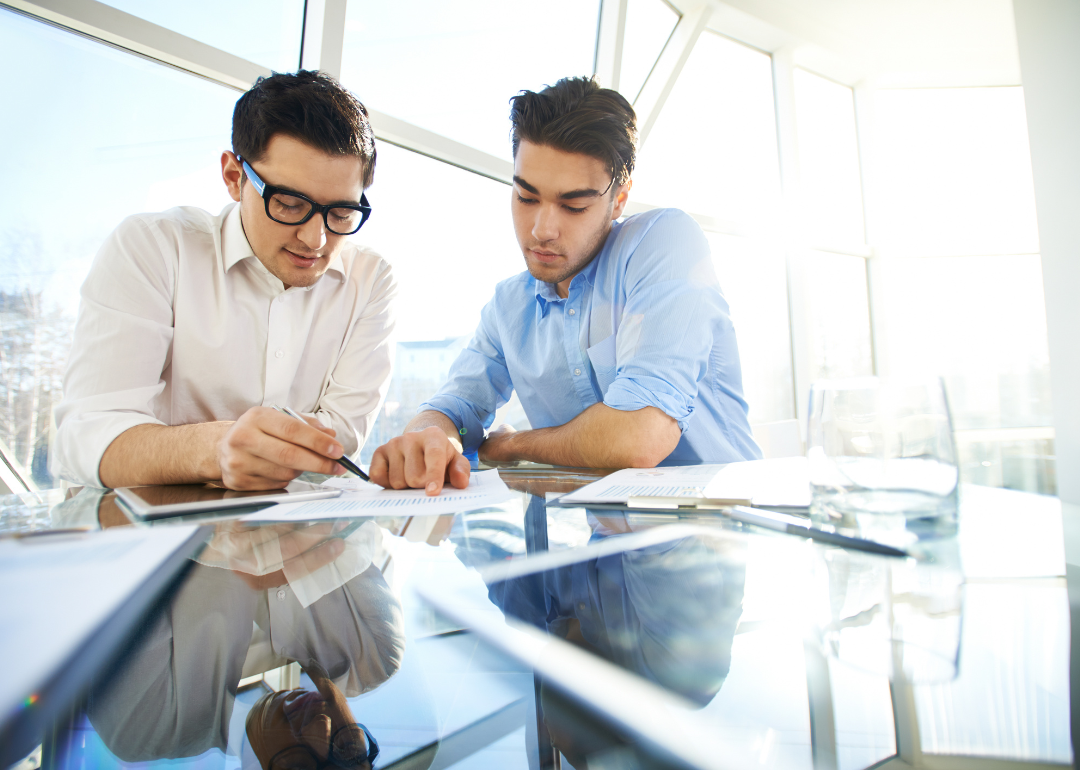 Financial analysts having a meeting