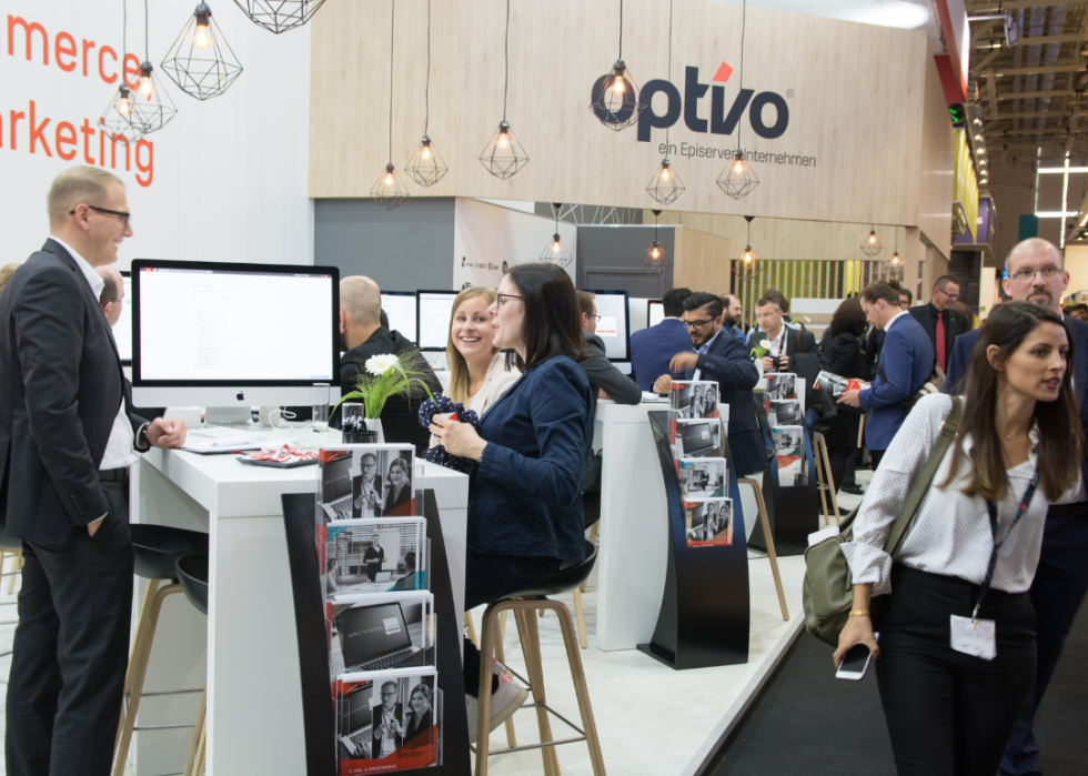 Young sales representatives at a digital marketing trade show