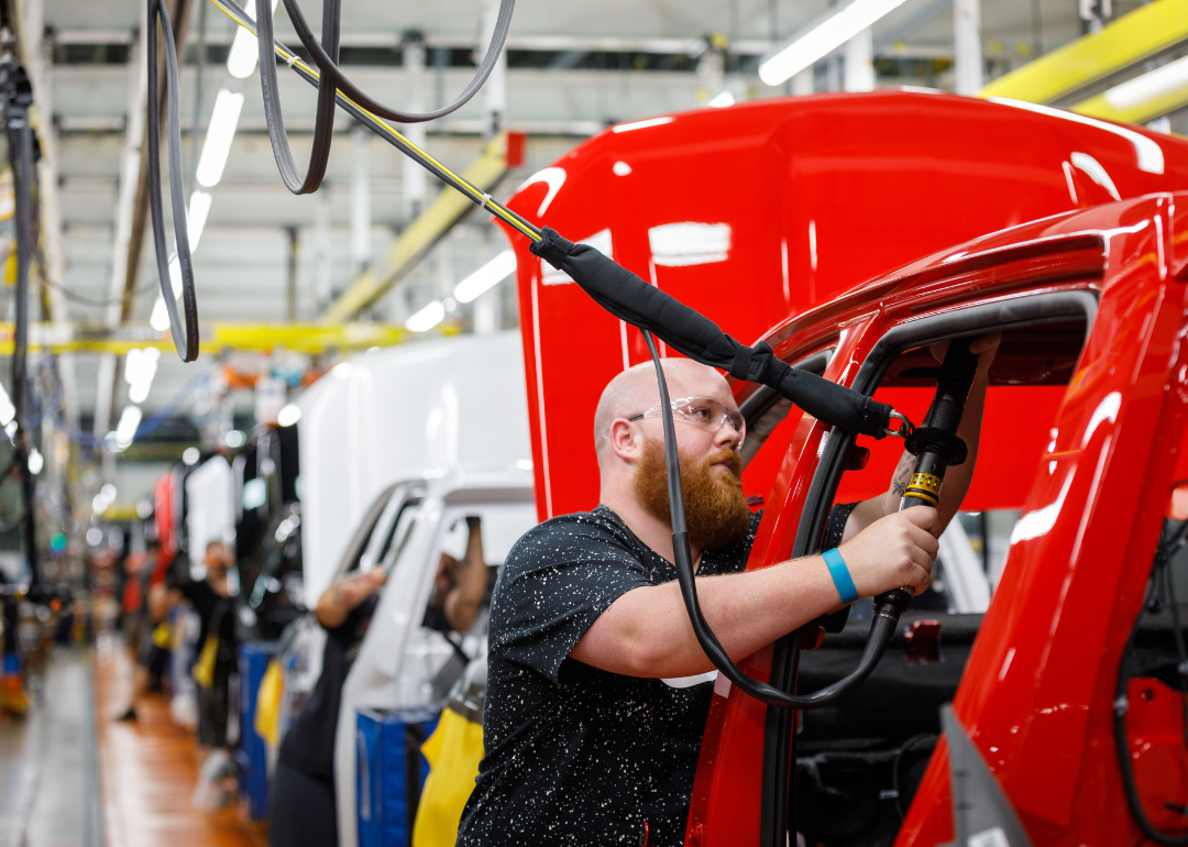 An assembly line at an auto manufacturing plant.
