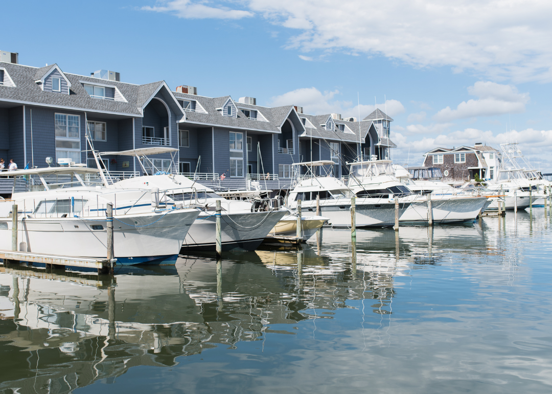 High-end yachts parked at docks boat club in Long Beach Island.