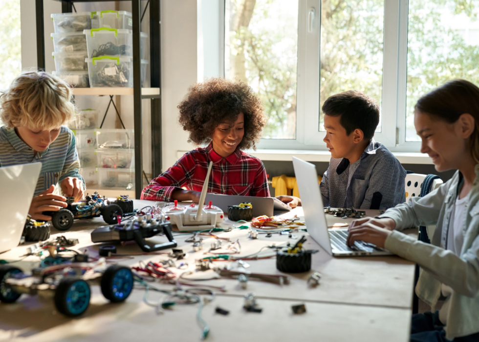 A group of students meeting for robotics club