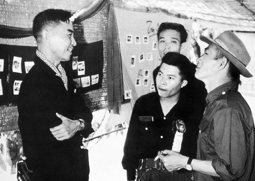 Huynh Tan Phat, president of the National Liberation Front, talking to journalists.
