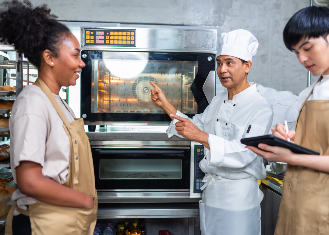 A chef teaching a high school cooking class.