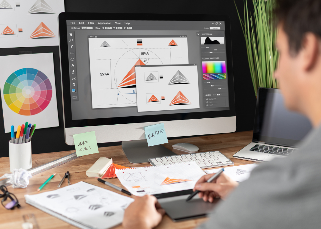 A graphic designer sketching a logo.