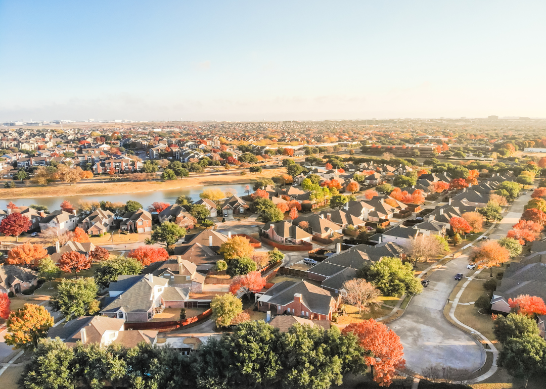 An aerial view of a waterfront residential subdivision's cul-de-sac, dead-end street in suburban Dallas.