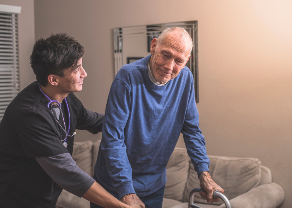 A hospice nurse visiting an elderly patient