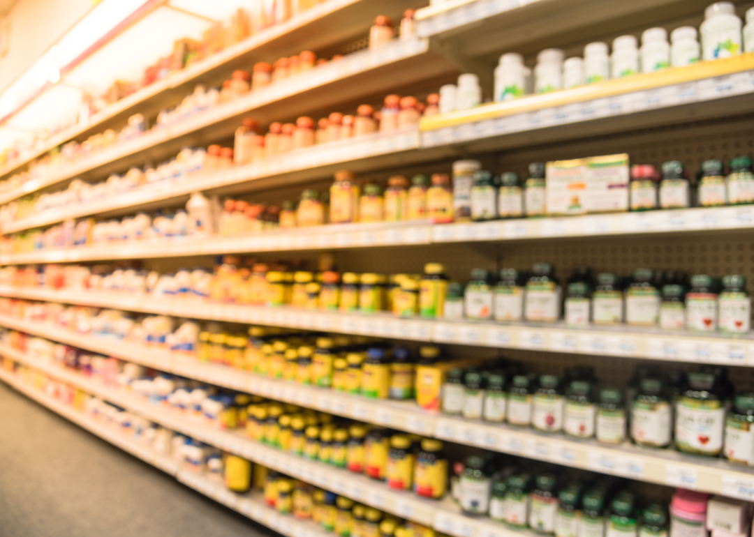 Shelves of vitamins in a retail location.
