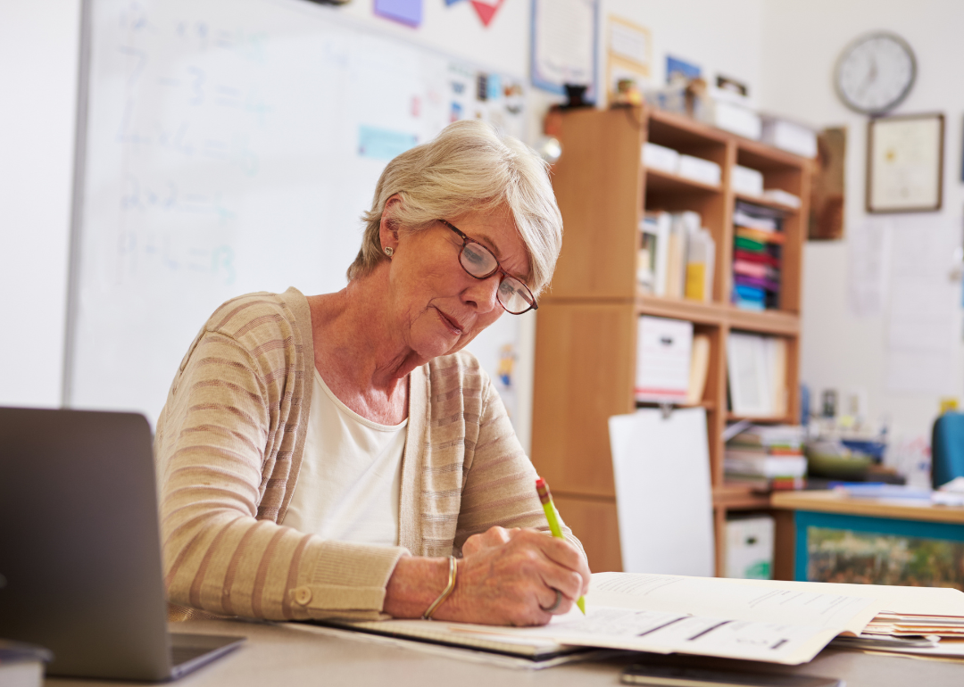 A teacher doing paperwork