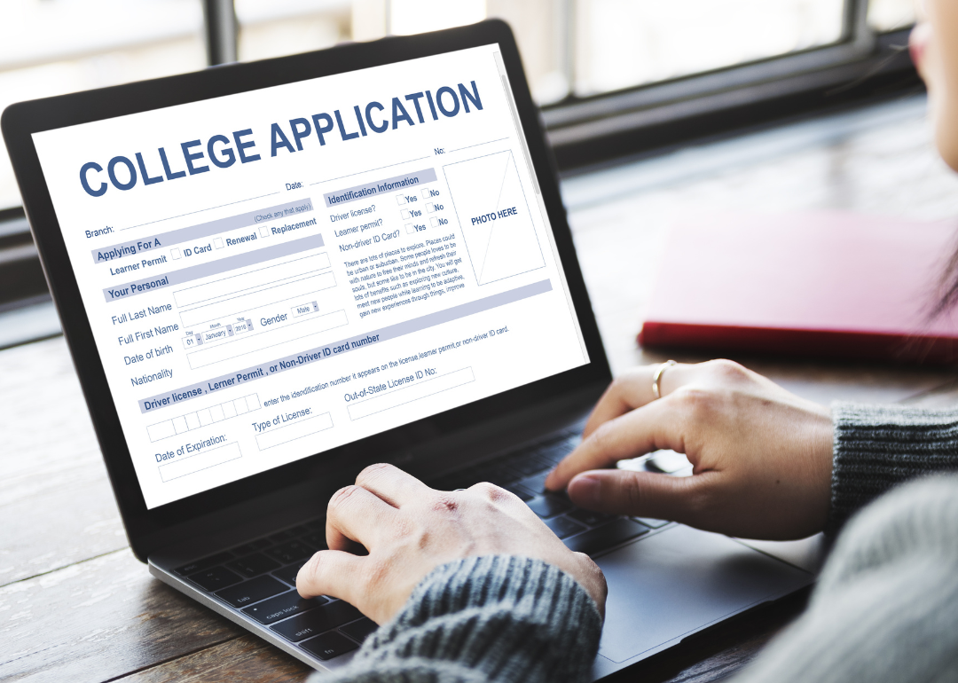 A student at their computer completing a college application