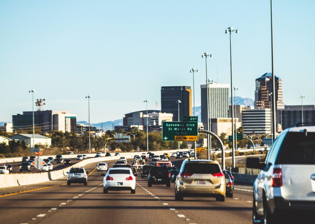 Cars driving into downtown Tucson.