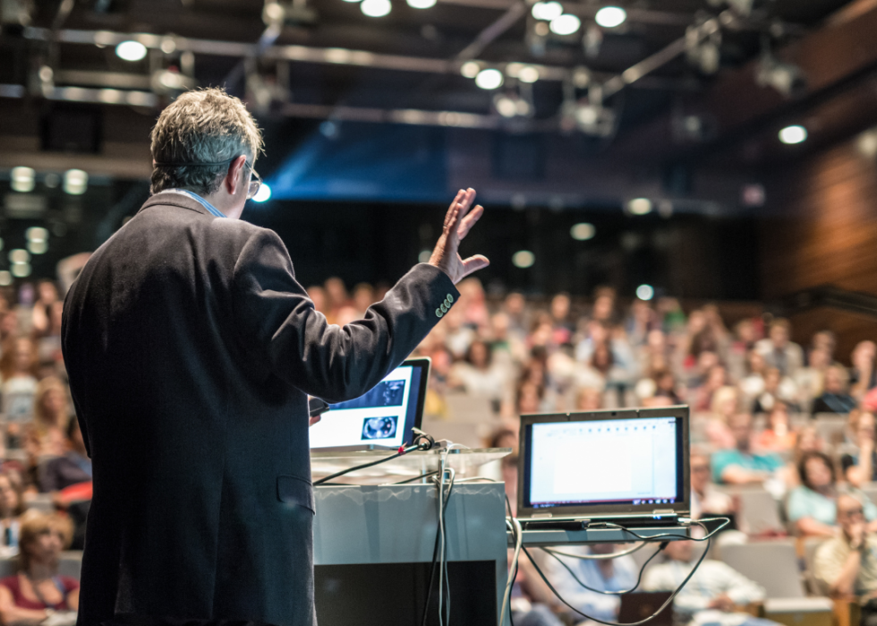 A professor speaking during a college class.
