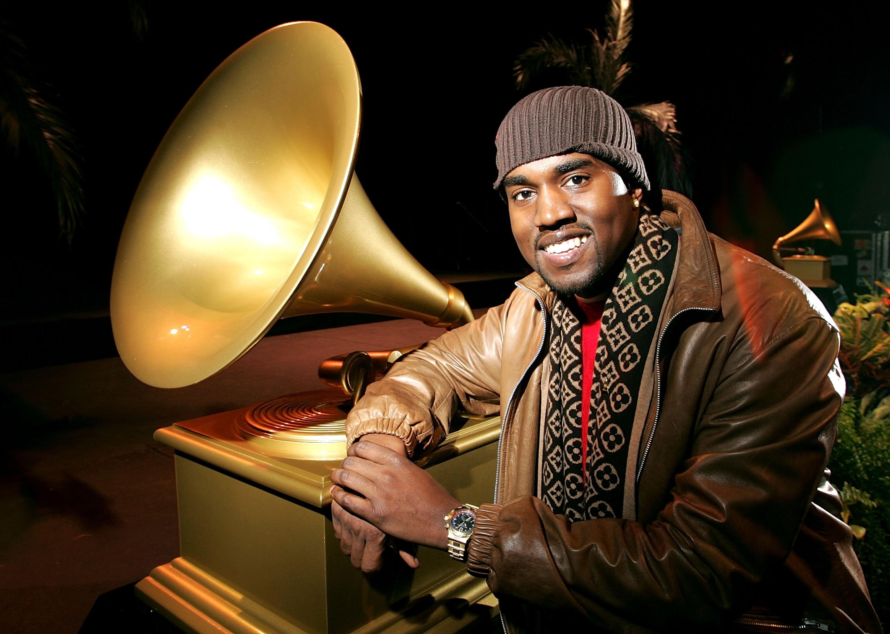 Kanye West smiles for the camera
