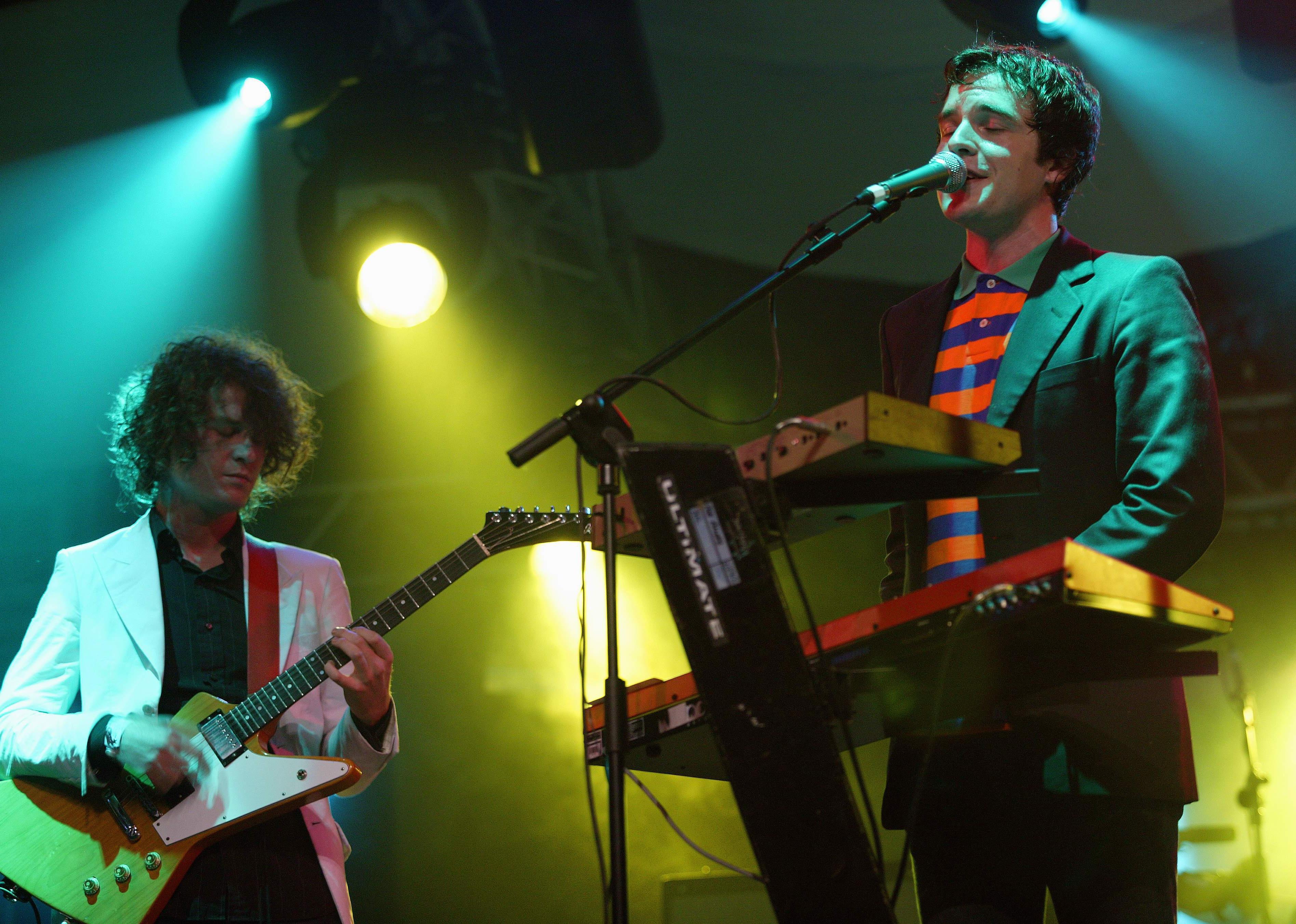 The Killers sing at a concert
