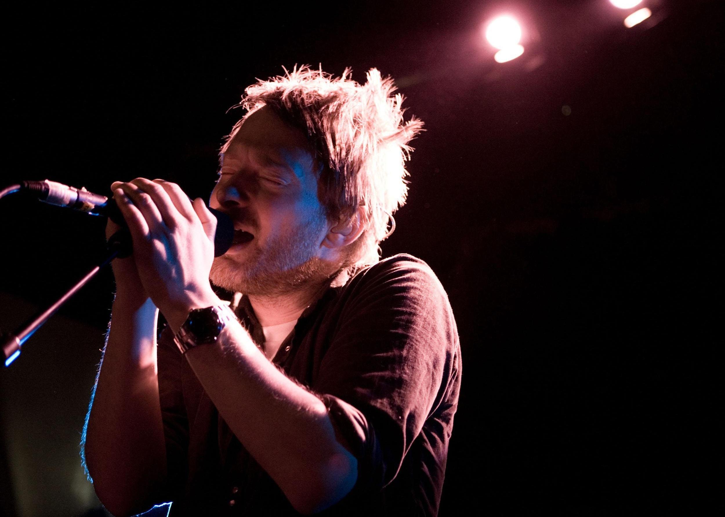 Thom Yorke of Radiohead sings at a concert