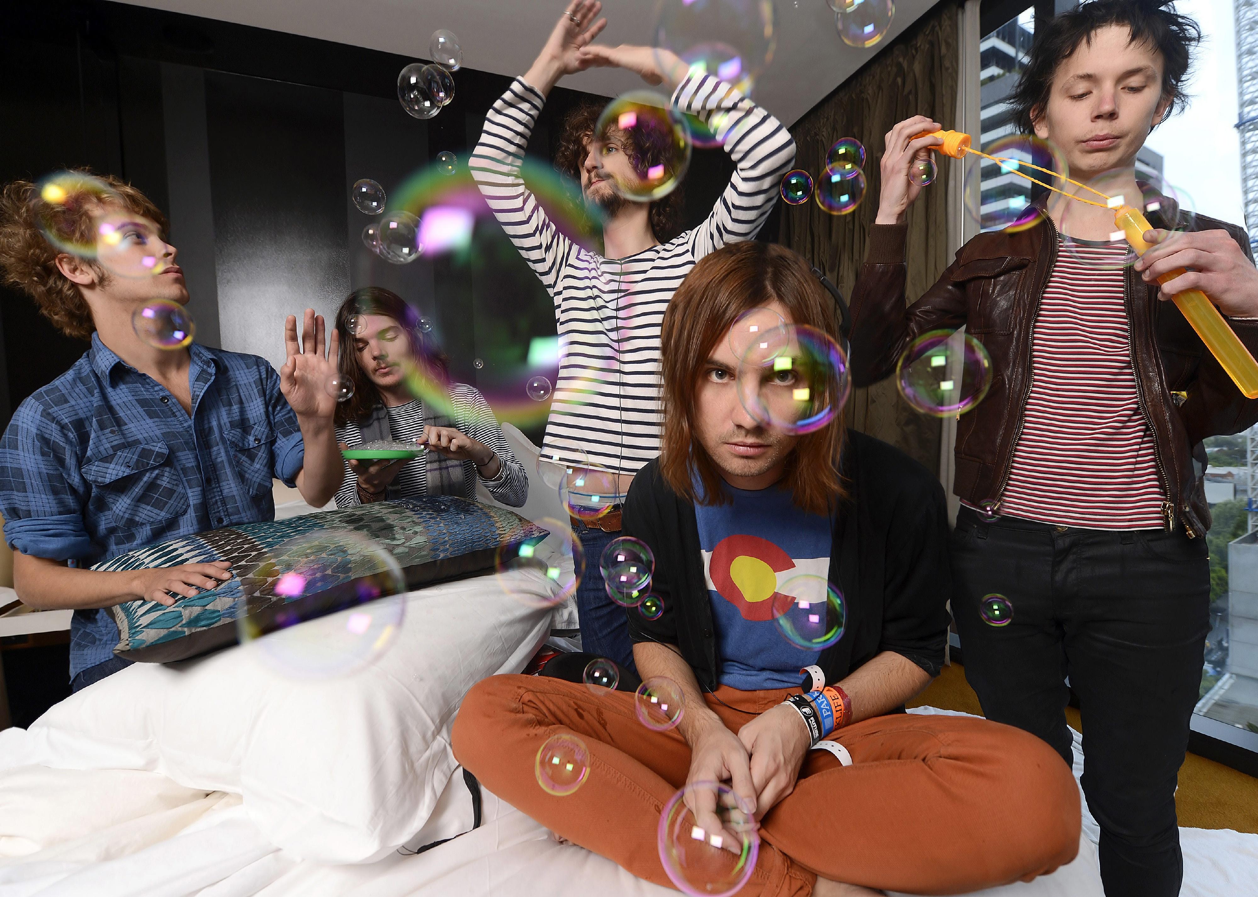 Tame Impala pose for a photo
