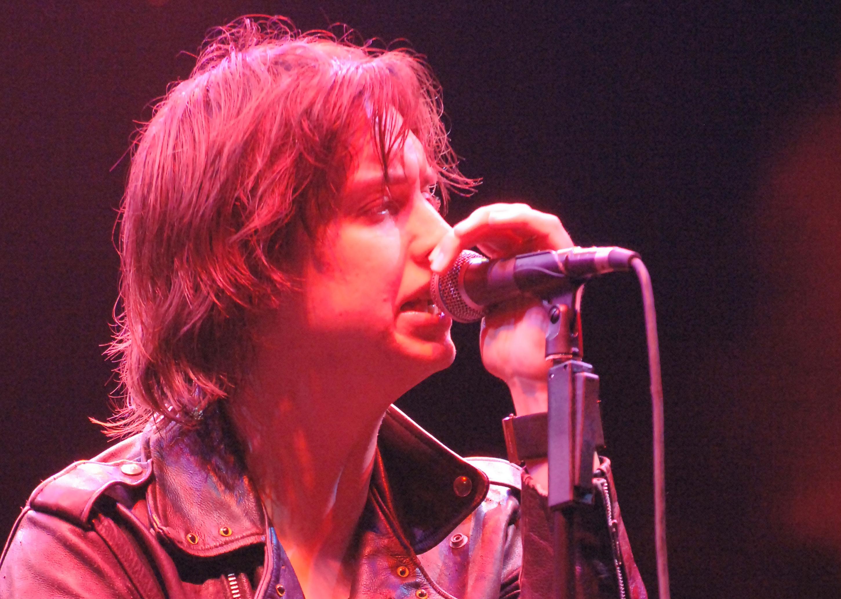 Julian Casablancas of The Strokes sings onstage